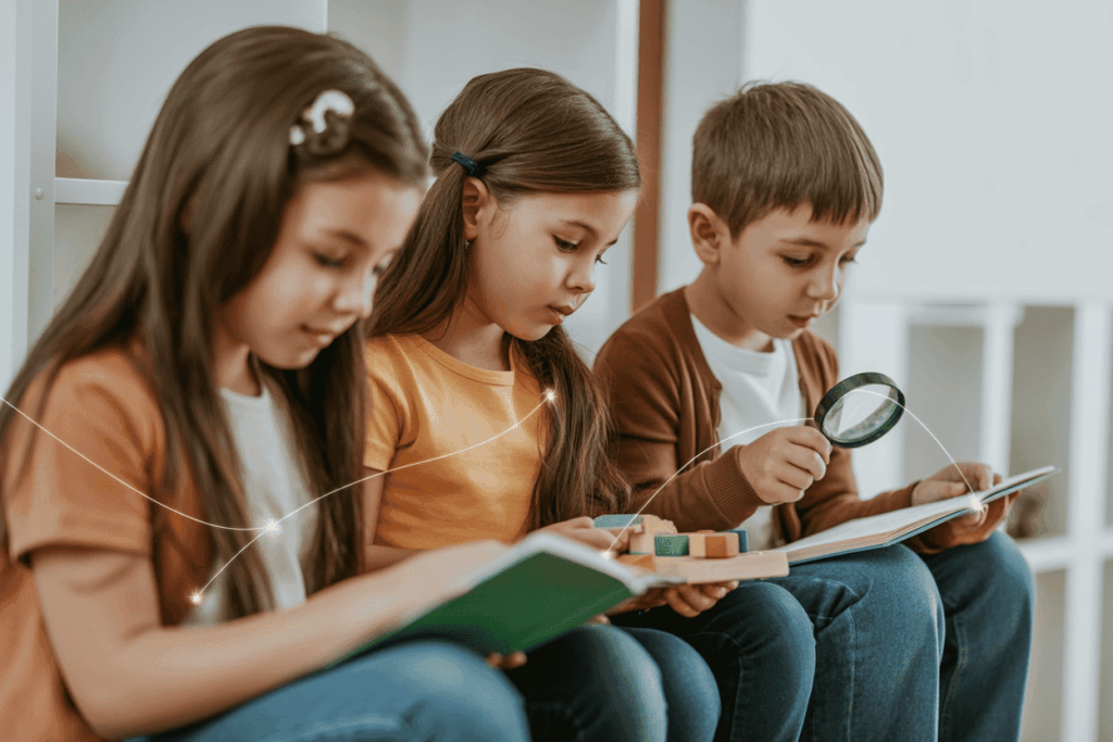 Three children learning in unique ways—reading, building with blocks, and using a magnifying glass—symbolizing creativity and individuality in education.